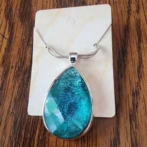 Tourqoise blue necklace.